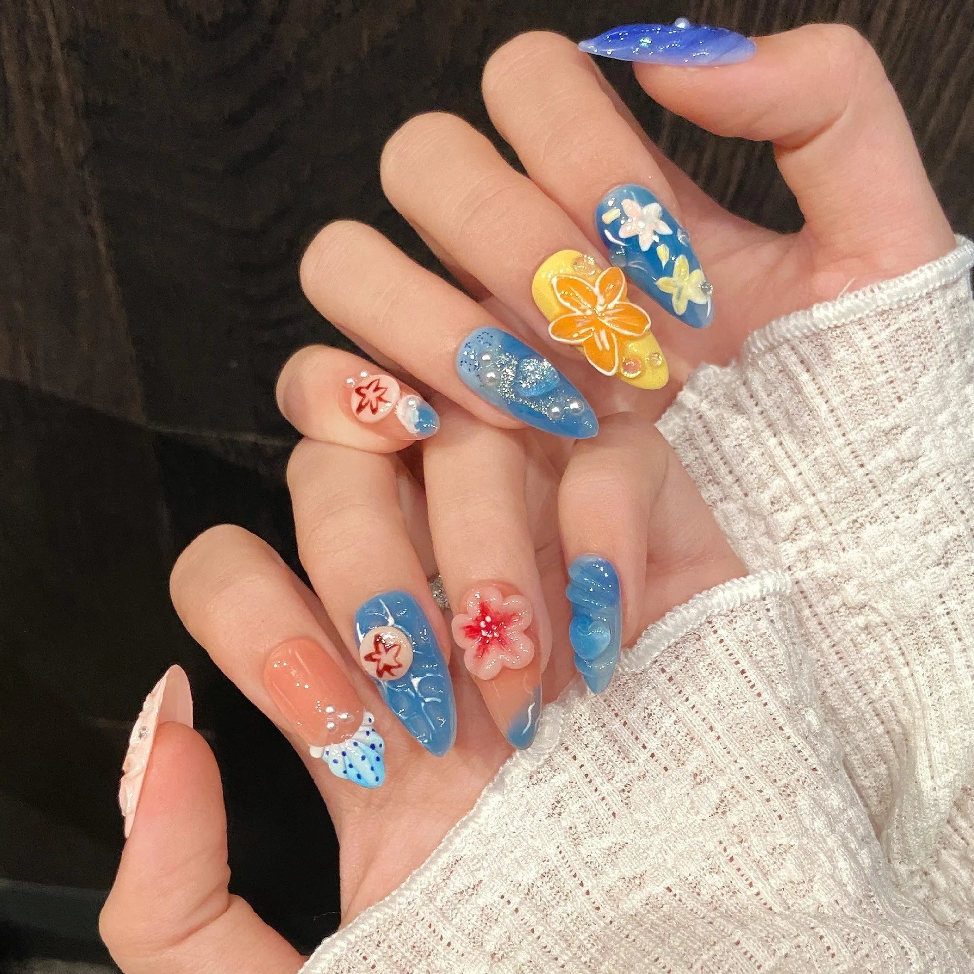 Three-dimensional carved jellyfish plastic wearable armour set in almond nail colour with marine theme