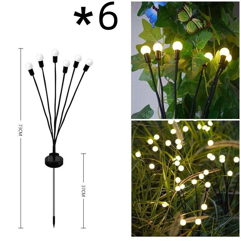 Solar-powered LED firefly ground lamp with multiple heads and ground spike for garden installation