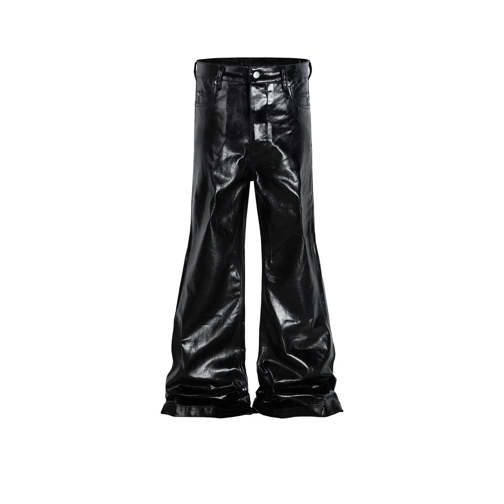 Black shiny patent leather coated skinny jeans on a denim background.