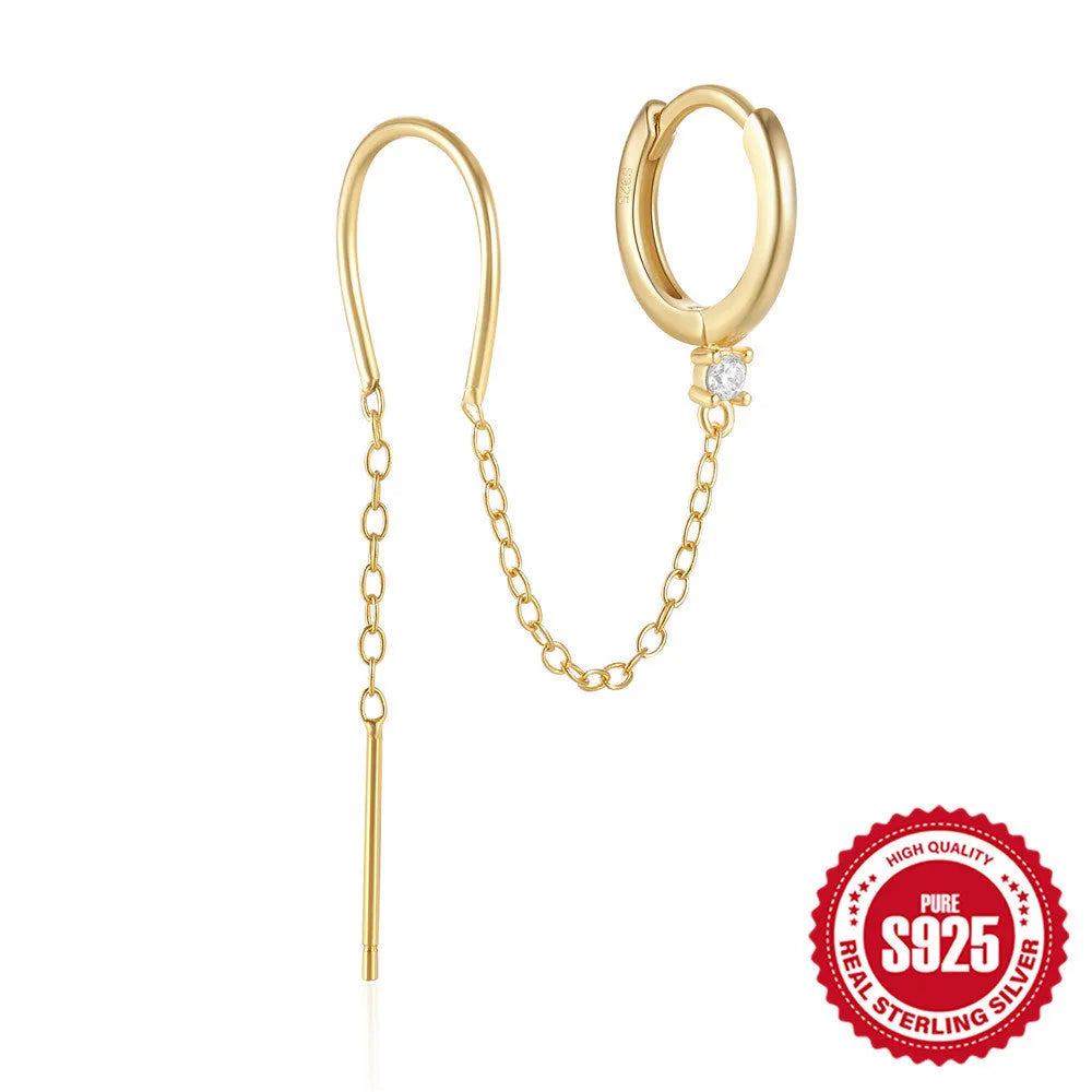 S925 sterling silver geometric drop earring with flower and tassel chain detail in a golden colour.