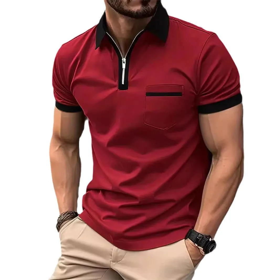 Man wearing a loose-fit casual short-sleeved shirt with a chest pocket and zipper decoration details.