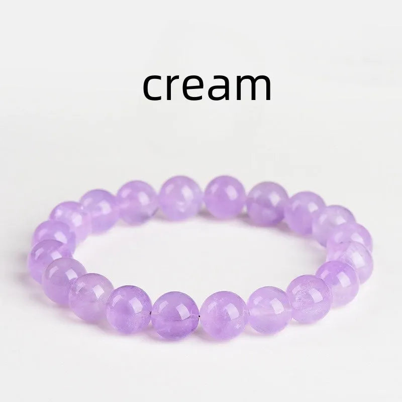 Lavender amethyst crystal bracelet with geometric round beads showing water ripple pattern