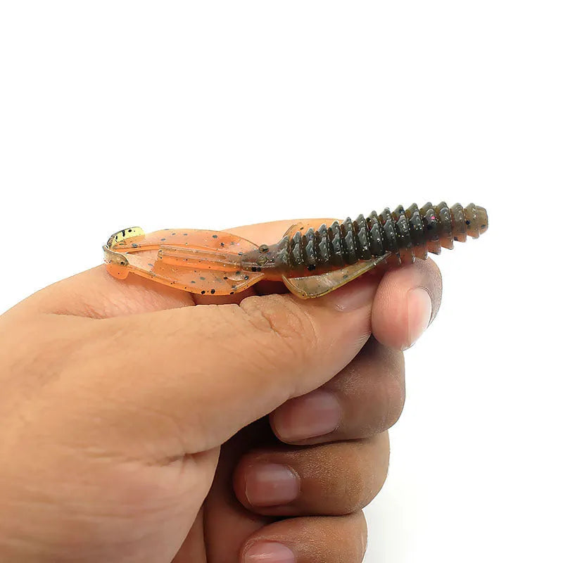 PVC soft plastic fishing lure in multiple colours showing detailed texture, 8cm and 12cm sizes displayed.