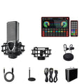 G4 professional sound card set with LCD screen, microphone, remote control, and cables on a desk.