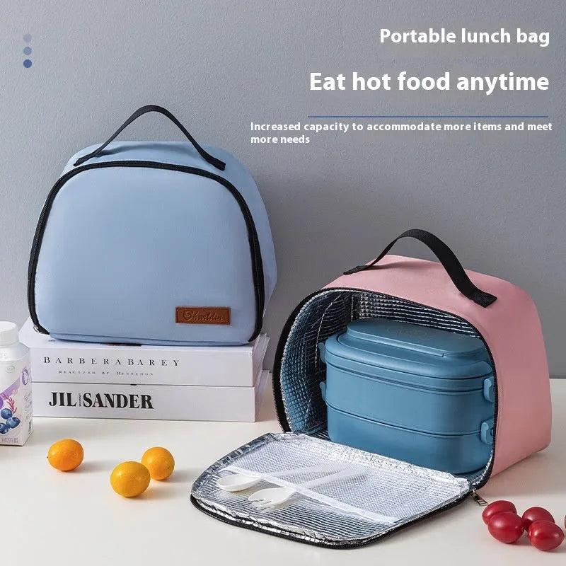 Insulated lunch box bag in textured cloth material showing colour options