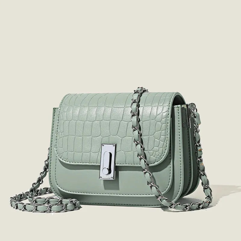 Soft PU women's crossbody shoulder bag in horizontal square shape, shown in green colour.