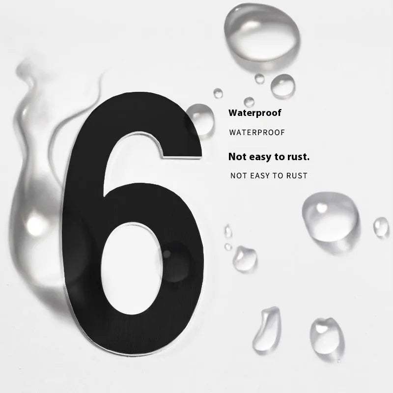 Black stainless steel self-adhesive house number sign with sticky backing, 7.5cm high.