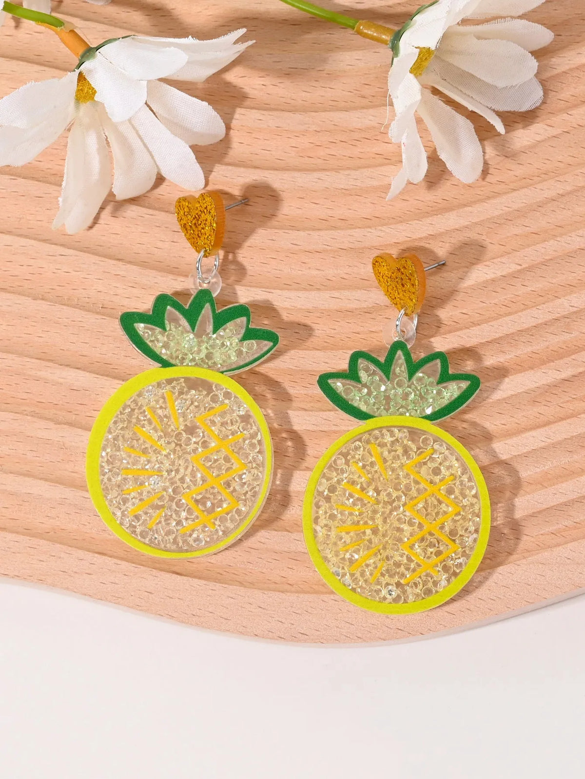 Colourful acrylic stud earrings with cherry, strawberry, watermelon, pineapple, coconut, cake, and ice cream designs.