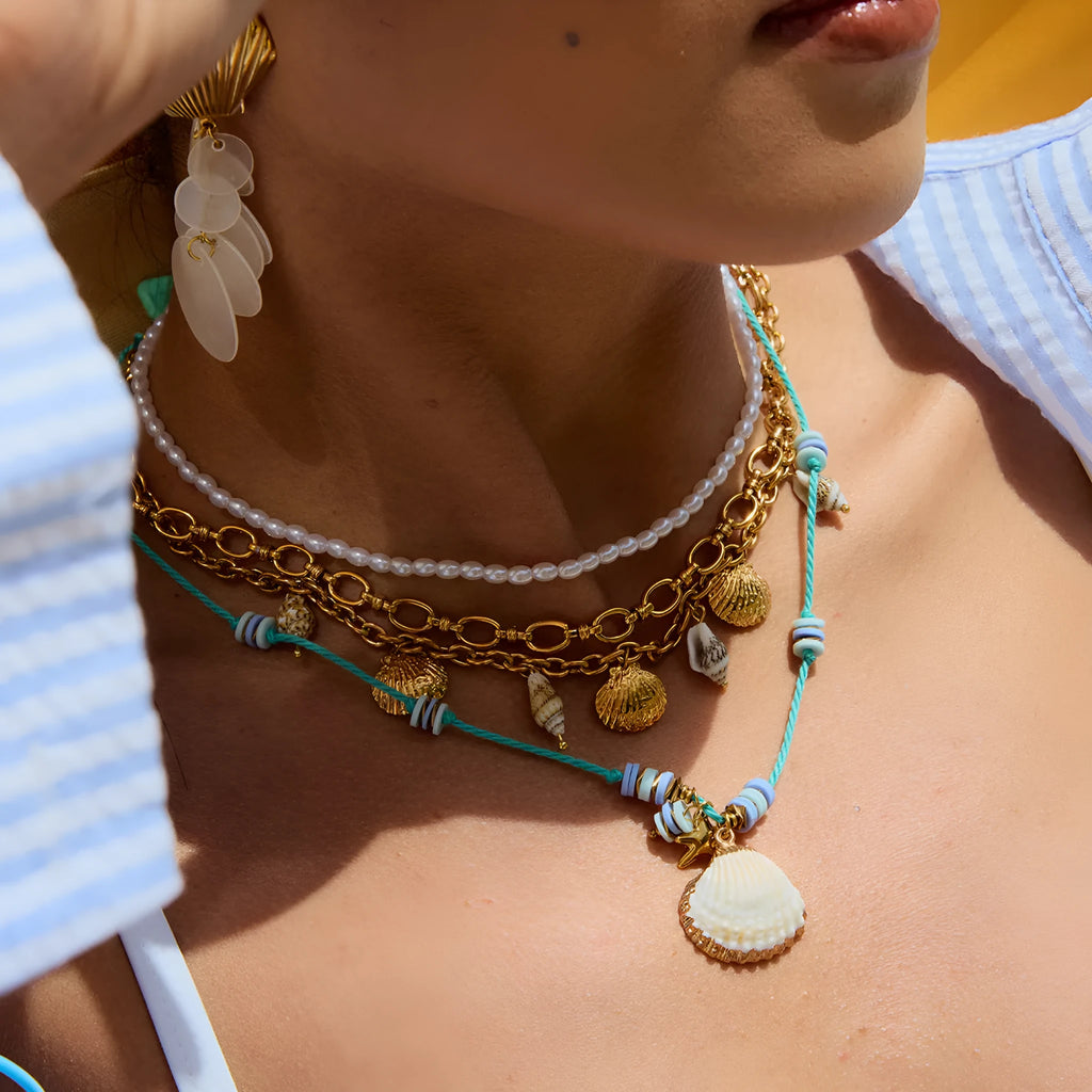 Titanium steel pearl necklace with geometric shell pendant on stainless steel chain