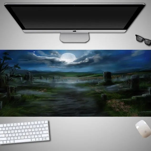 Oversized Halloween-themed gaming mouse pad on a desk, showing anti-slip base and graphic design.