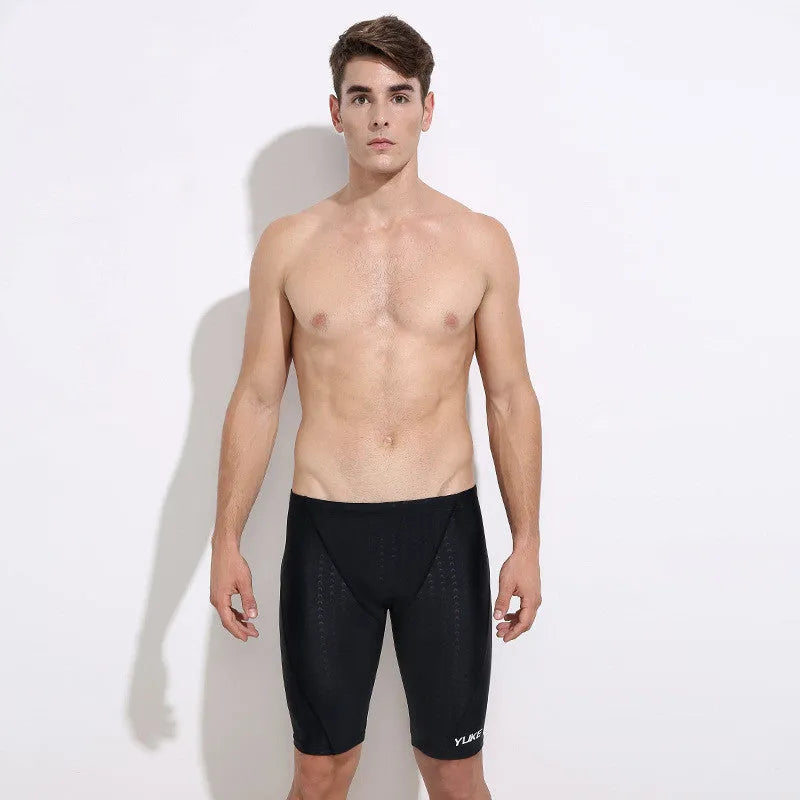 Men's black 5-piece waterproof swimming set including briefs trunks, anti-fog goggles, swimming cap, ear plugs with nose clip and carry bag