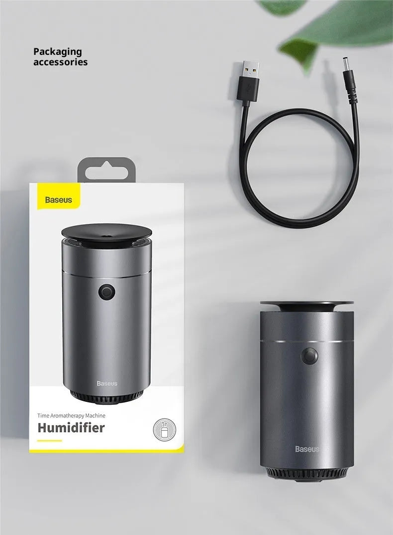 Dark gray column-shaped mini USB aromatherapy humidifier with 5W power and 0.5-1L reservoir for car and small room use