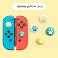 Four silicone rocker caps for Nintendo Switch Joy-Con analogue sticks in assorted colours.