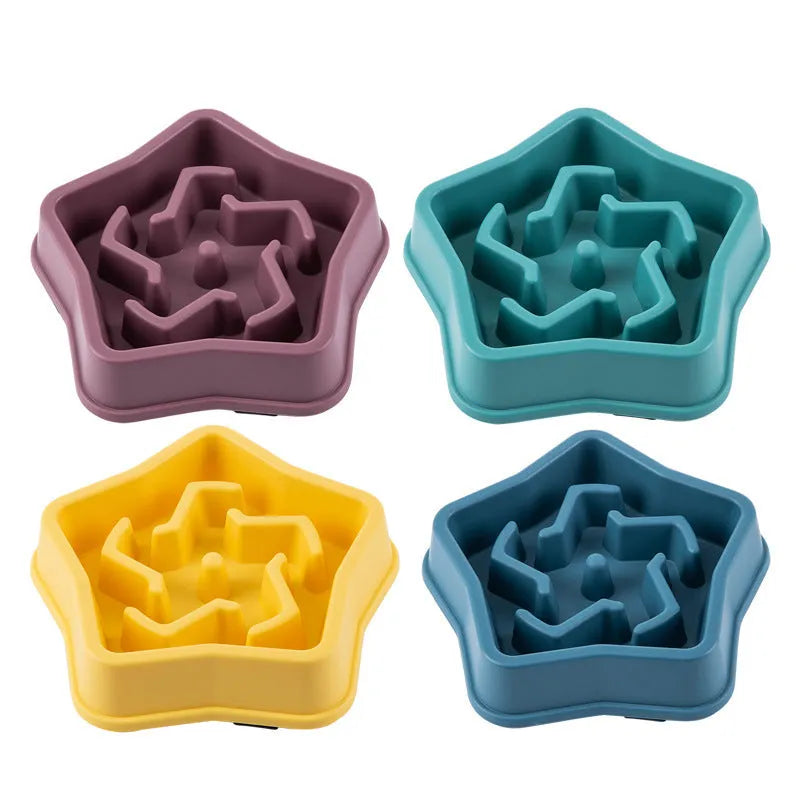 Yellow plastic dog slow feed bowl with pet-shaped obstacle inside