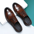 Men's black and brown brogue leather shoes for business with a PU leather upper.