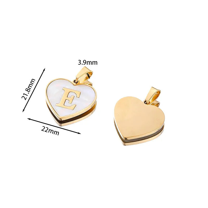 Gold plated chain necklace with a white shell heart-shaped pendant personalised with a single letter initial.