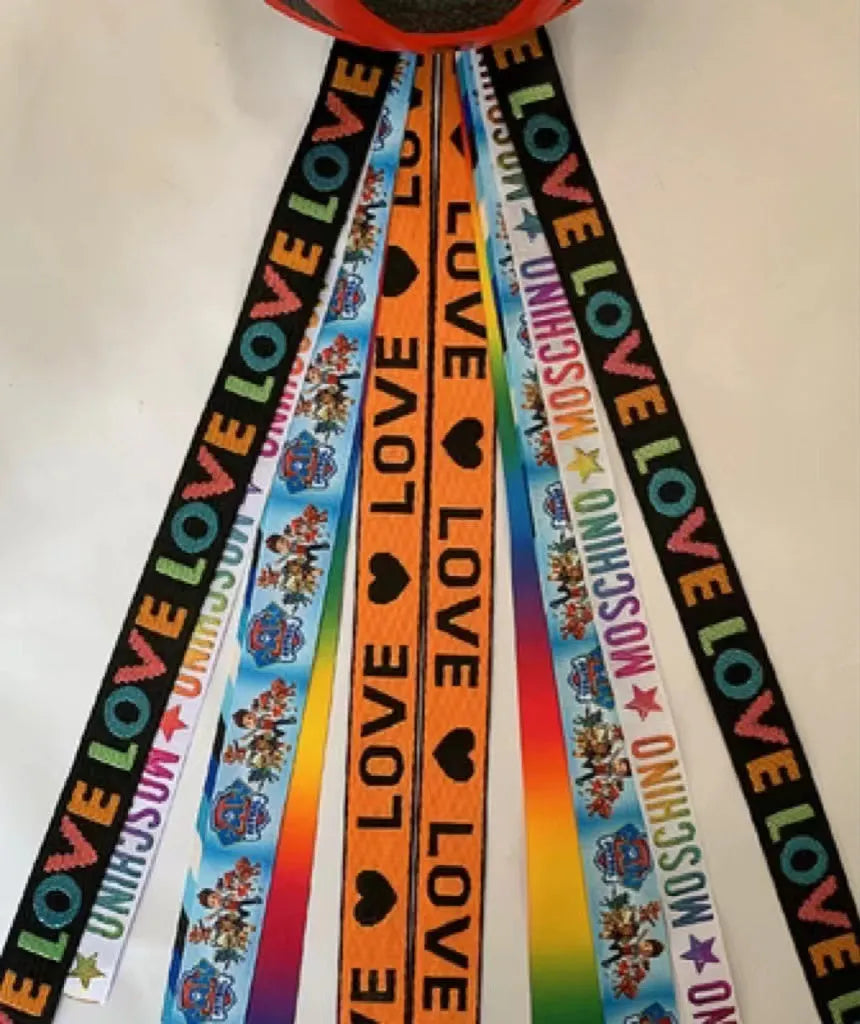 Colourful ribbon streamers for decorating a child's skating or skiing helmet.