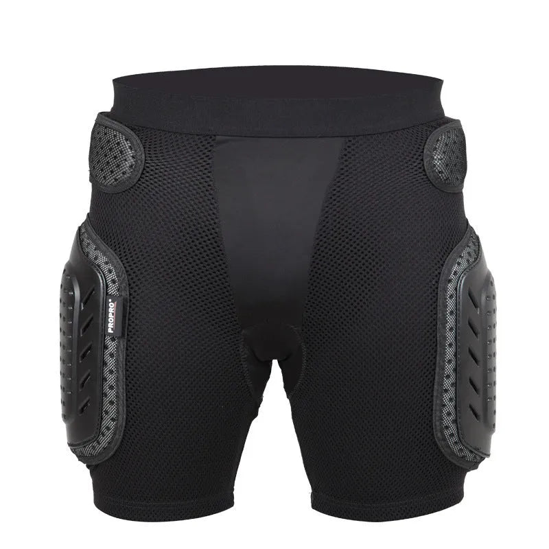 Black cycling hip protection pants showing hip pad placement, labelled with available sizes S, M, L, XL.
