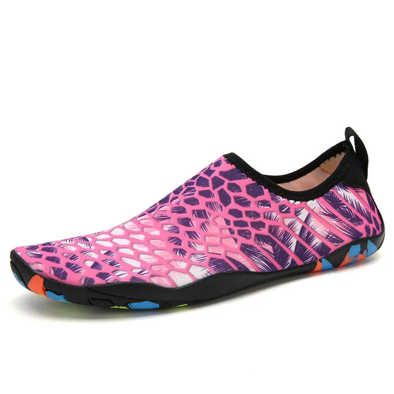 Men's and women's beach wading shoes in blue, with Lycra upper and EVA midsole, on a sandy background.