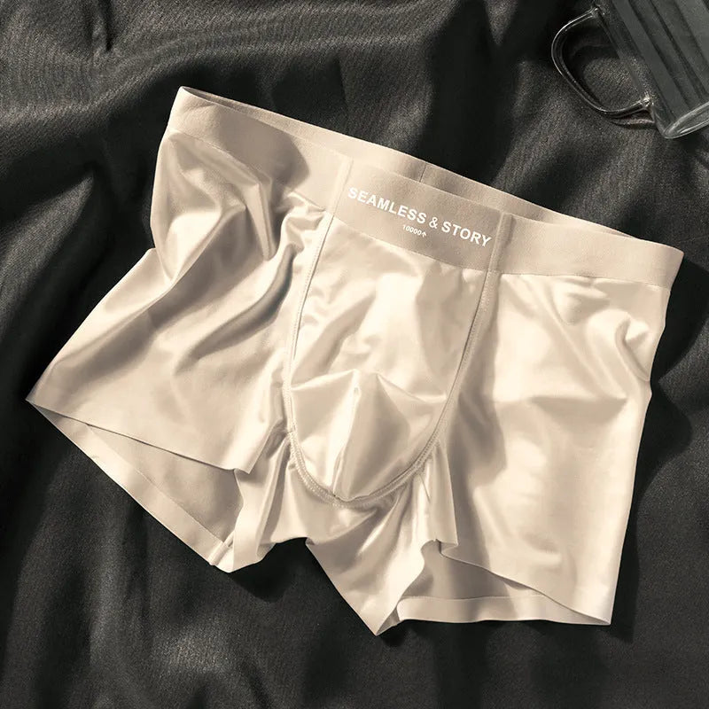 Ice silk men's underwear in mid waist design showing traceless fit and satin weave texture