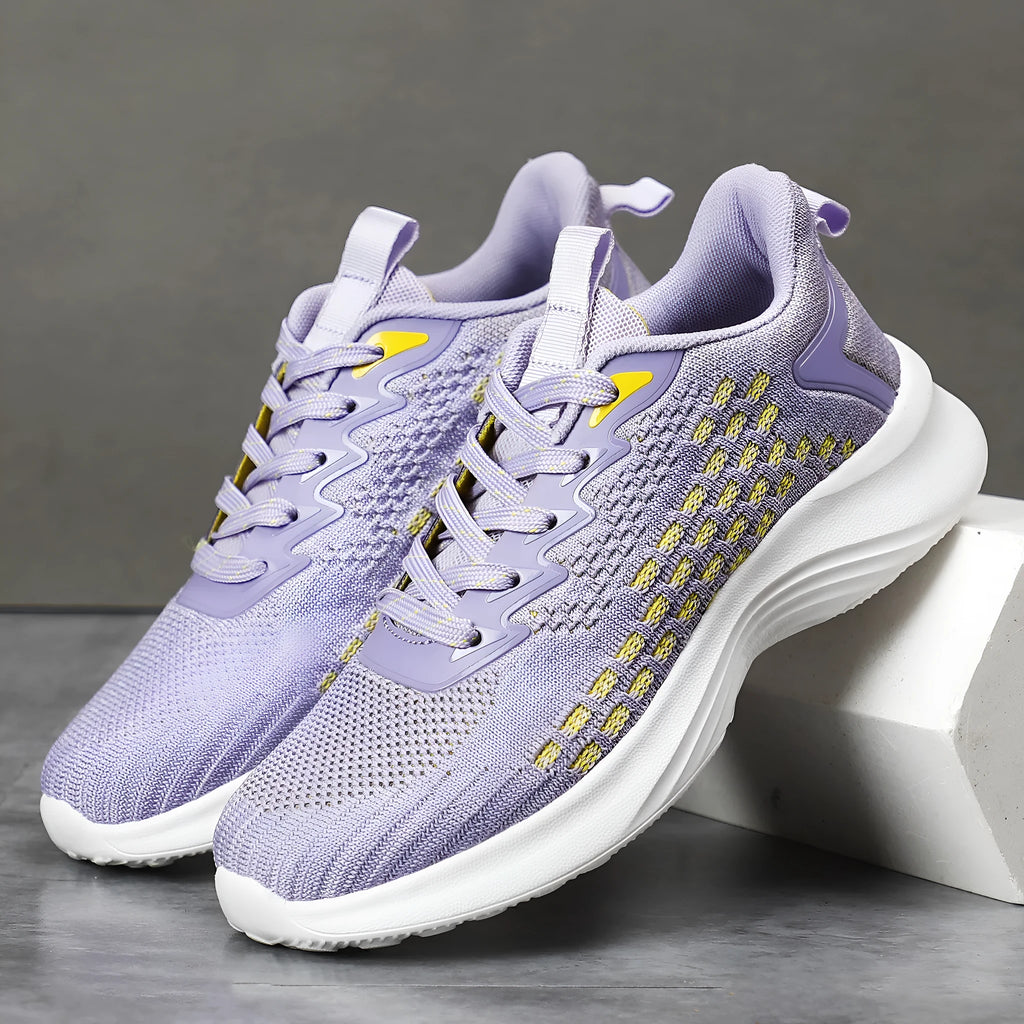 Lavender purple women's Flyknit running shoes with striped pattern and EVA sole.