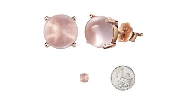 Rose gold plated drop shape stud earrings with a synthetic quartz crystal inlay detail.