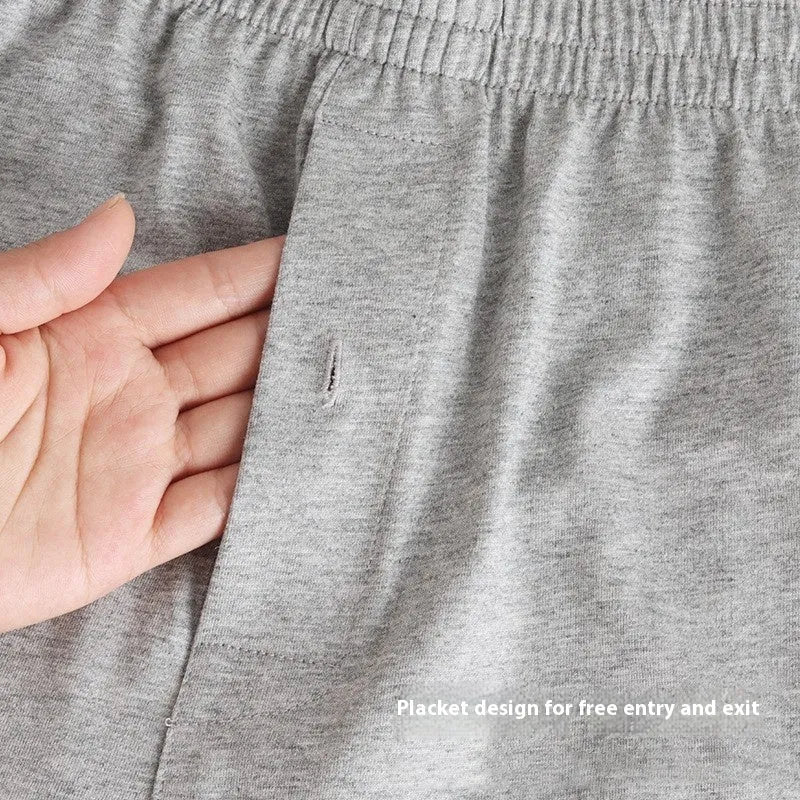 Men's high-waist cotton boxer shorts in black, grey, and navy blue on a size chart