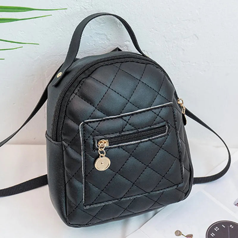 Girls' Korean style embroidered backpack in hard PU measuring 16x7x19cm in black, white or pink