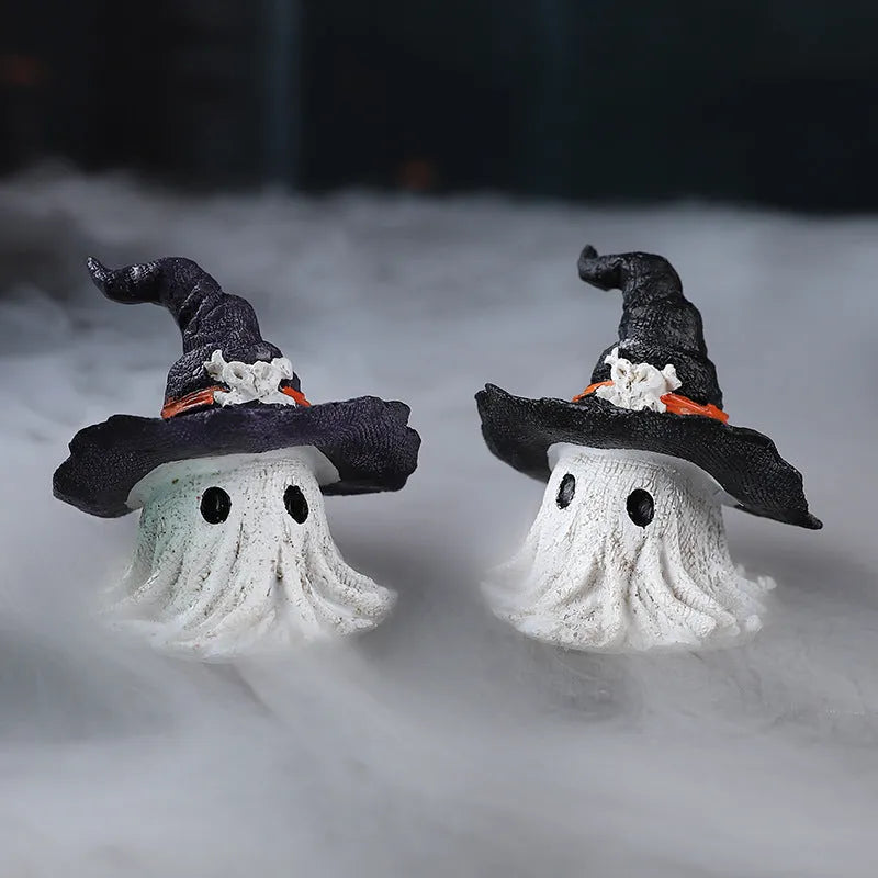 A detailed resin wizard hat ornament with a ghost theme in either kid-purple or black colour.