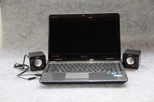 Black square USB-powered desktop computer speaker for 700B PC model.