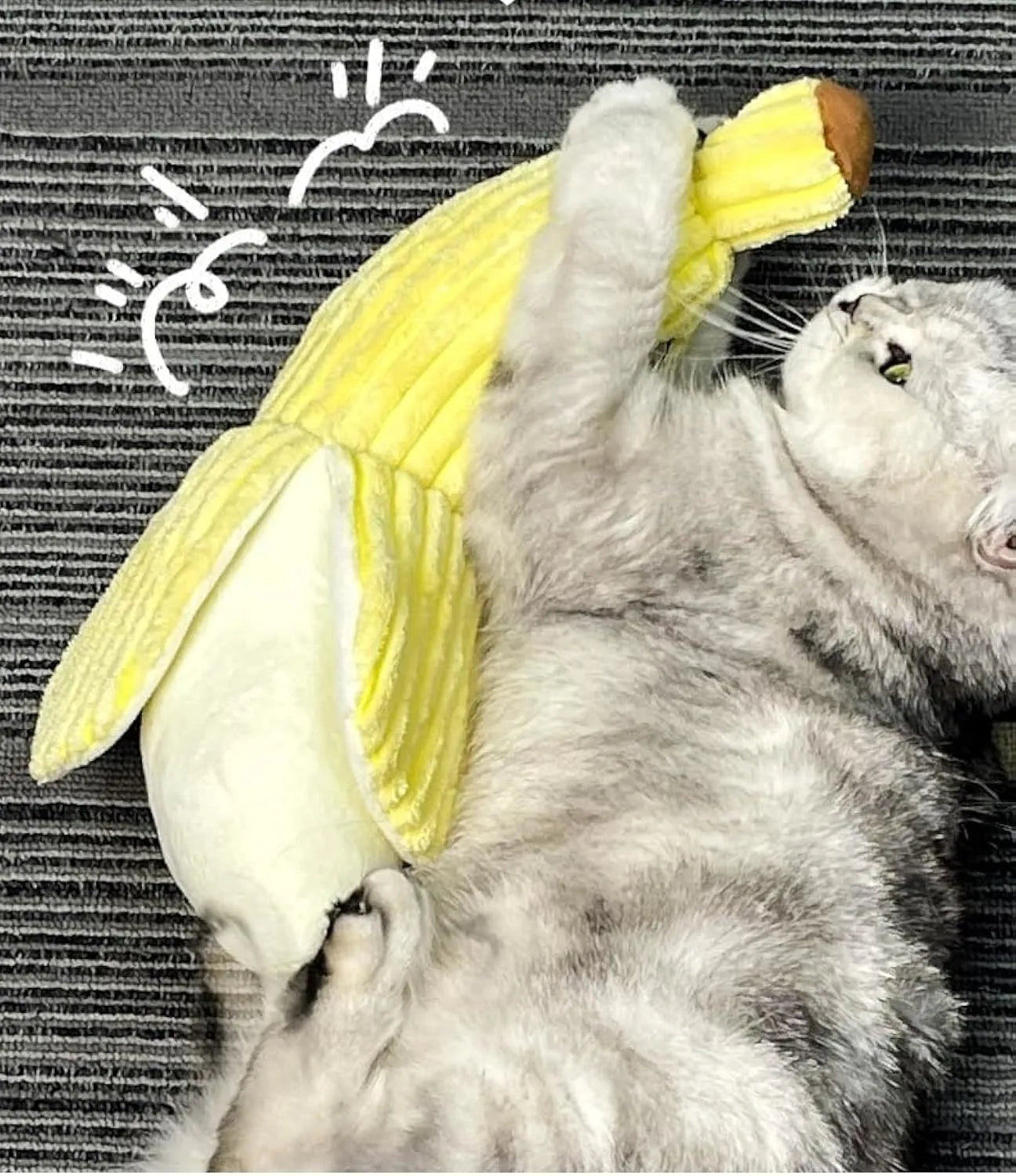 Yellow banana-shaped cat toy with crinkle paper and plush fabric for chewing and kicking