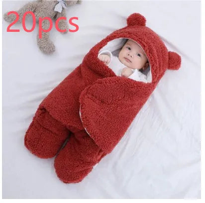 Cotton blend baby quilted sleeping bag wrapper in a choice of six colours and three infant sizes.