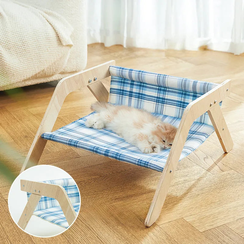 Wooden elevated cat bed with beach chair design and soft cloth hammock in blue colour