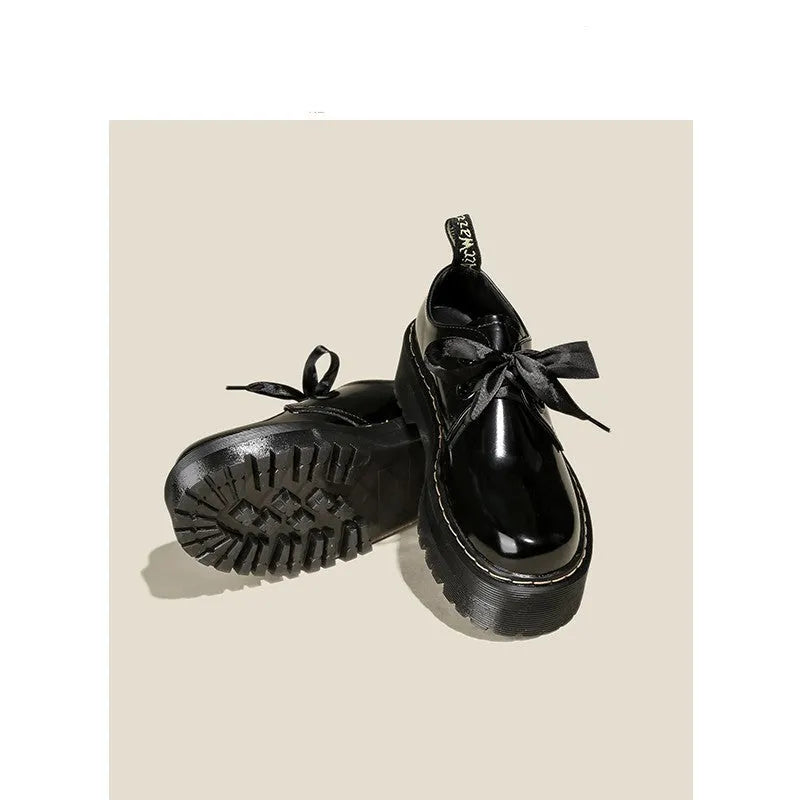 Black women's thick-soled lace-up shoes with ribbon detail on a superfine fibre upper.