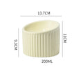 Ceramic elevated cat bowl in green with tilted round shape and raised feeding height
