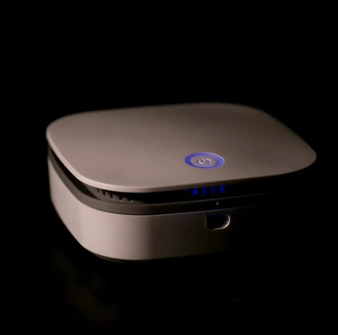 White USB-powered negative ion air purifier for car interiors and small rooms.