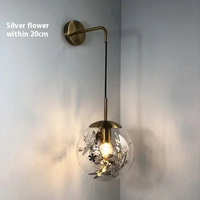 Modern simple glass wall-mounted bedside lamp in golden or silver finish.