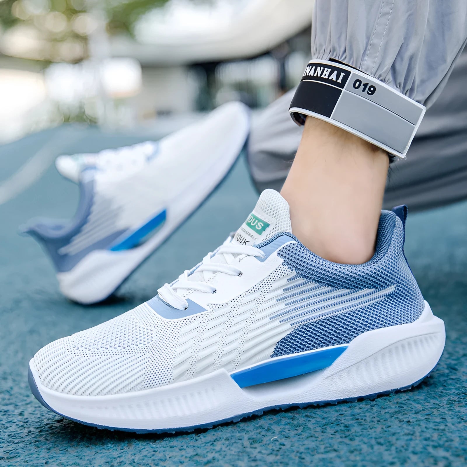 Men's blue casual sports mesh shoes with cloth upper and injection moulded sole in round toe design