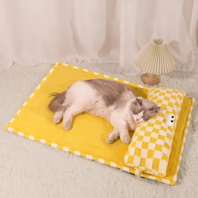 Grey rectangular plush pet cushion for dogs or cats on a wooden floor.