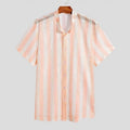 Pink waffle knit men's cardigan shirt with short sleeves laid flat