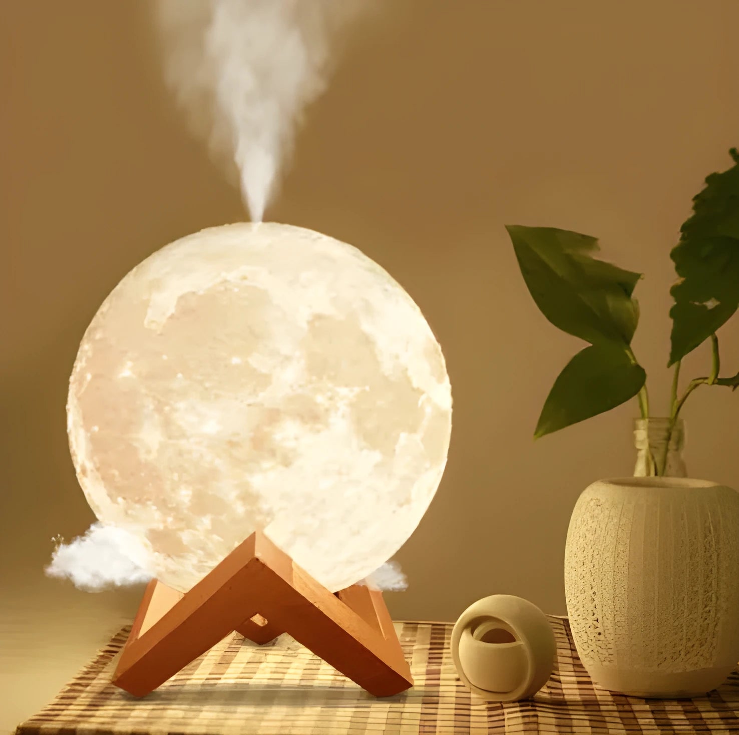 Lunar humidifier night light with spherical design, 13cm diameter, showing LED lighting and water tank