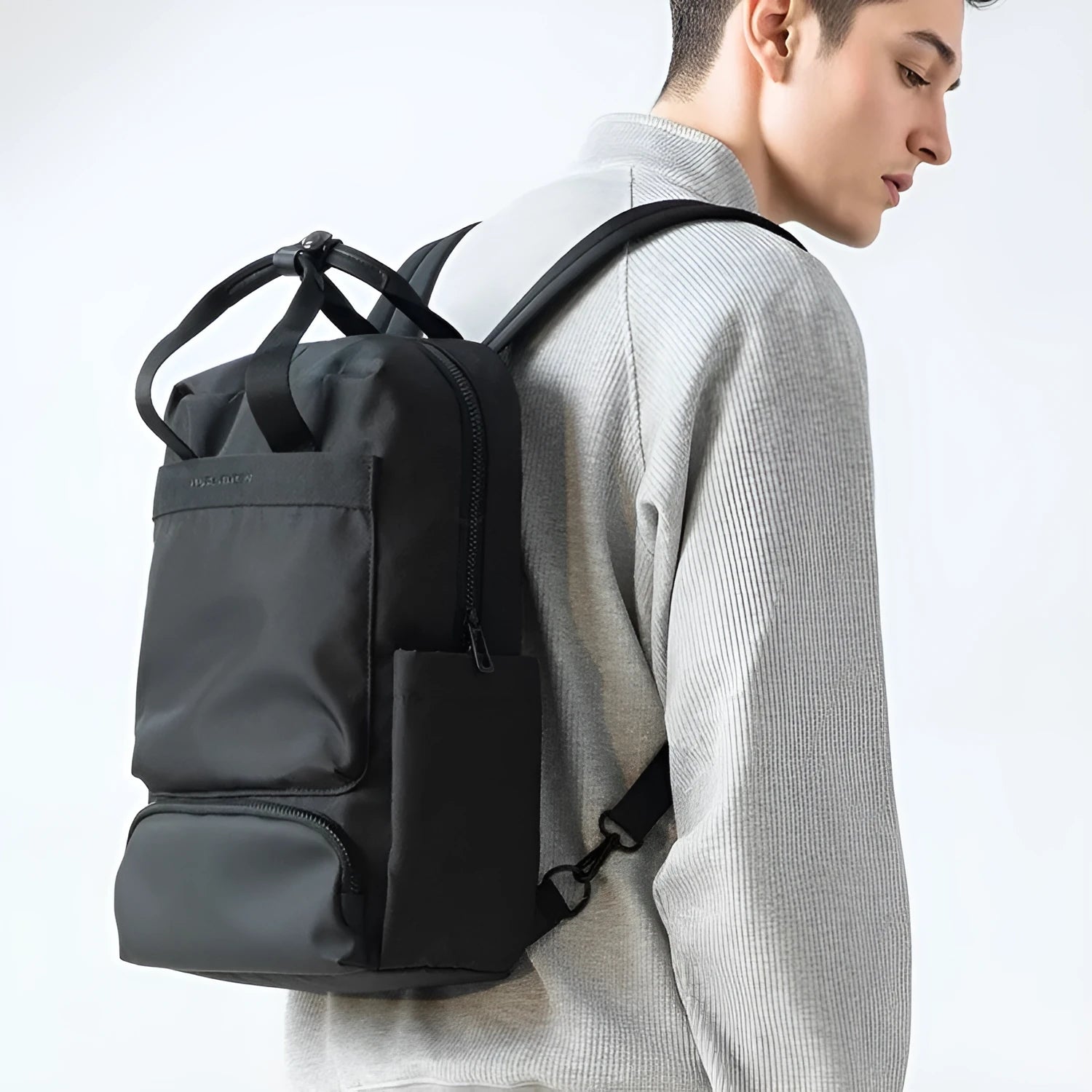 Oxford cloth computer backpack in elegant black with 20-35 litre storage capacity and polyester lining