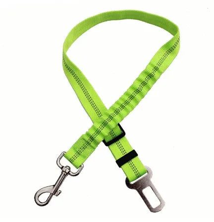 Black adjustable dog seat belt with reflective safety rope attached to car seat belt buckle, polyester webbing and alloy joint visible