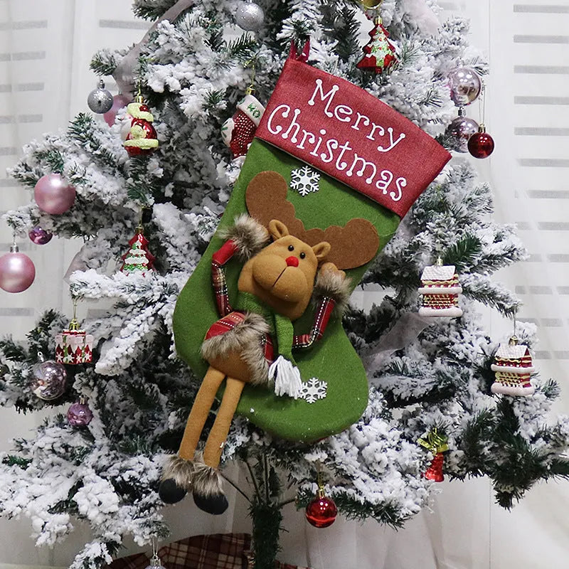 Set of three large Christmas stockings with Santa, Snowman, and Reindeer 3D designs hanging on a fireplace