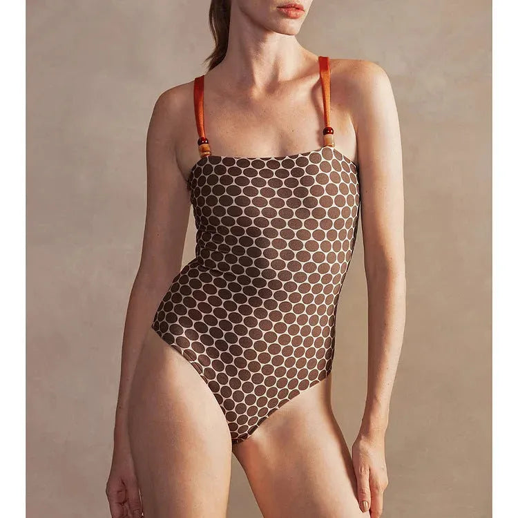 Women's dot print one-piece swimsuit with matching wrap skirt set