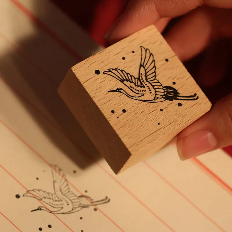 Wooden stamp with rubber printing surface featuring traditional Chinese crane design