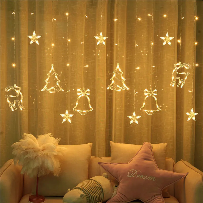 LED Christmas curtain lights with deer and tree pendants in warm white on a window