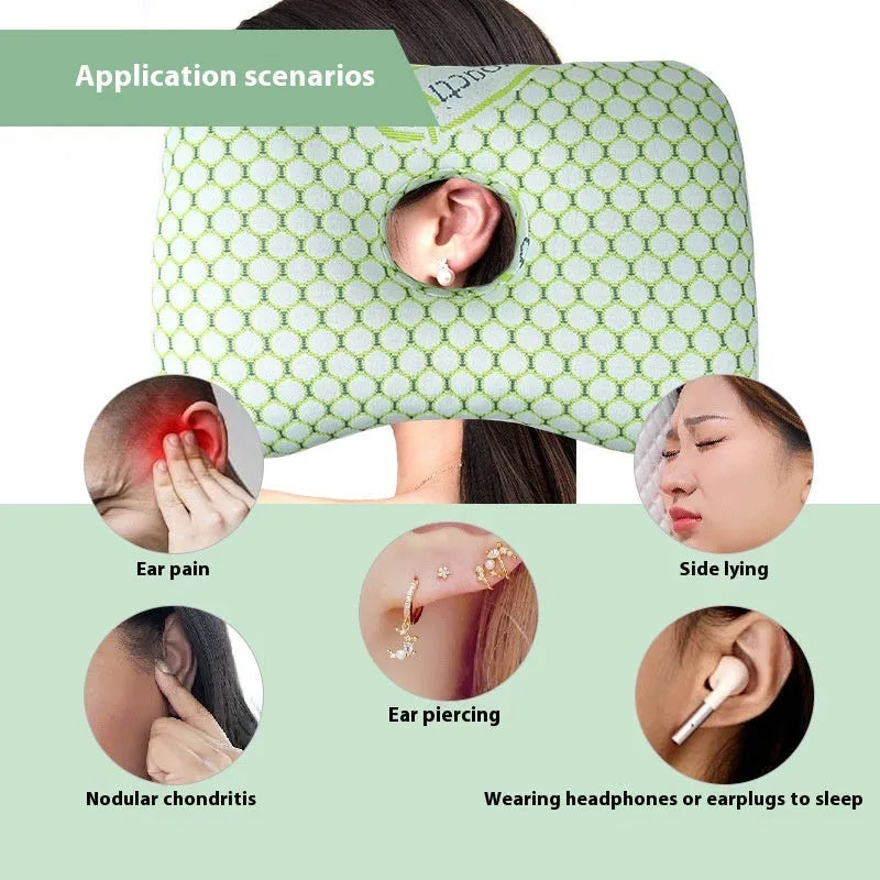 Single hole ear support pillow in grey on a white background, showing its contour and compact size.