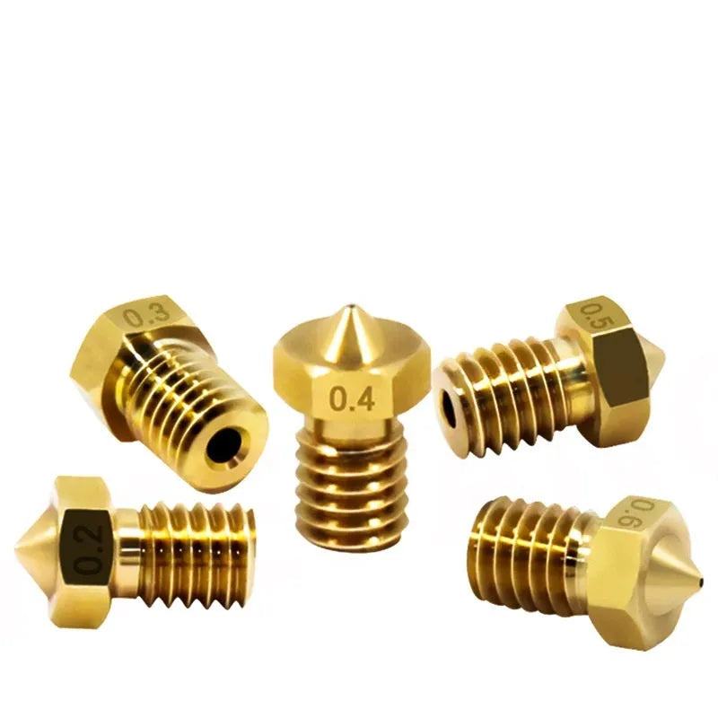 Close-up of a brass E3D-style 3D printer nozzle with M6 thread, showing its precise machining.