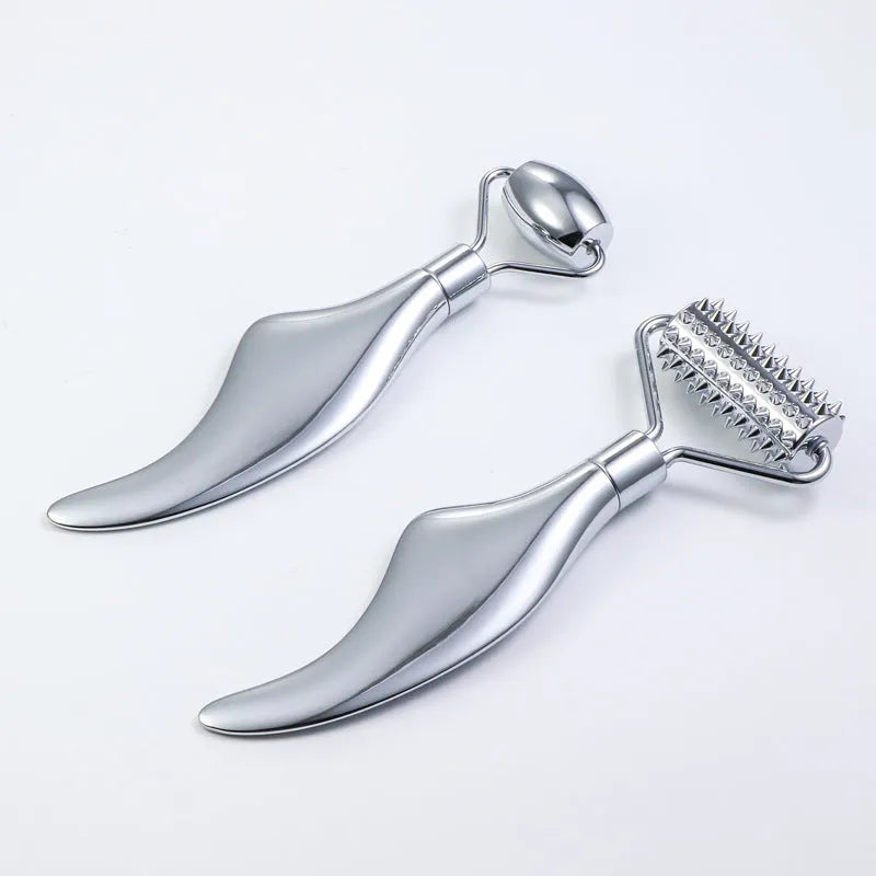 Stainless steel heart-shaped facial eye roller and double-headed massage scraping board set.
